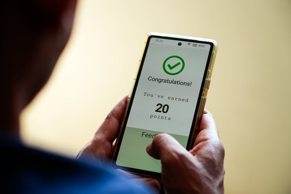 Kunde får besked om optjente point på mobilen