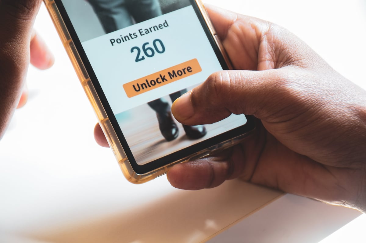 Kunde samler point i en digital loyalitetsapp